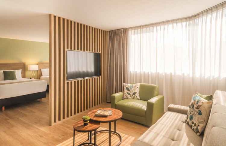 Double Suite with two beds and a separate living area at Stanza Hotel CDMX