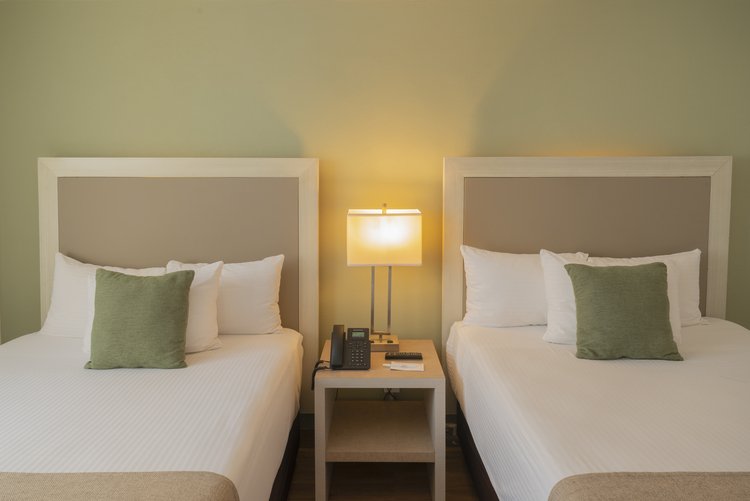 Dos camas matrimoniales en Habitación Doble de Stanza Hotel CDMX